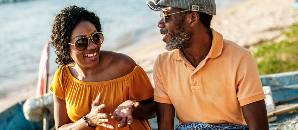Rollovers and the gas-defferal deception. African American couples smiling at the beach.